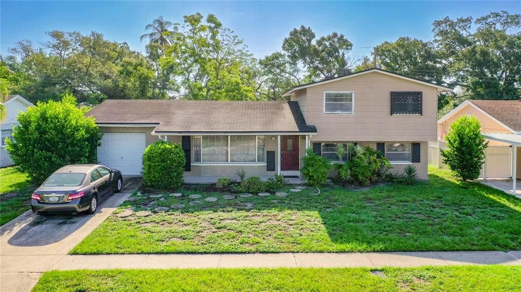 6413 ROSEWOOD DRIVE TAMPA, FL 33615