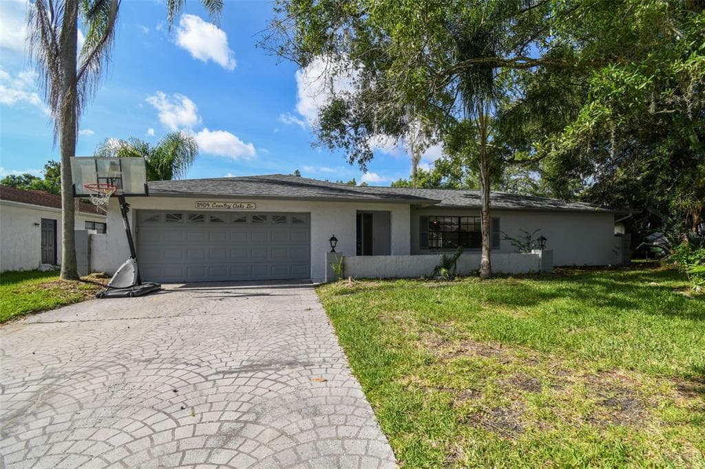 11404 COUNTRY OAKS DRIVE TAMPA, FL 33618