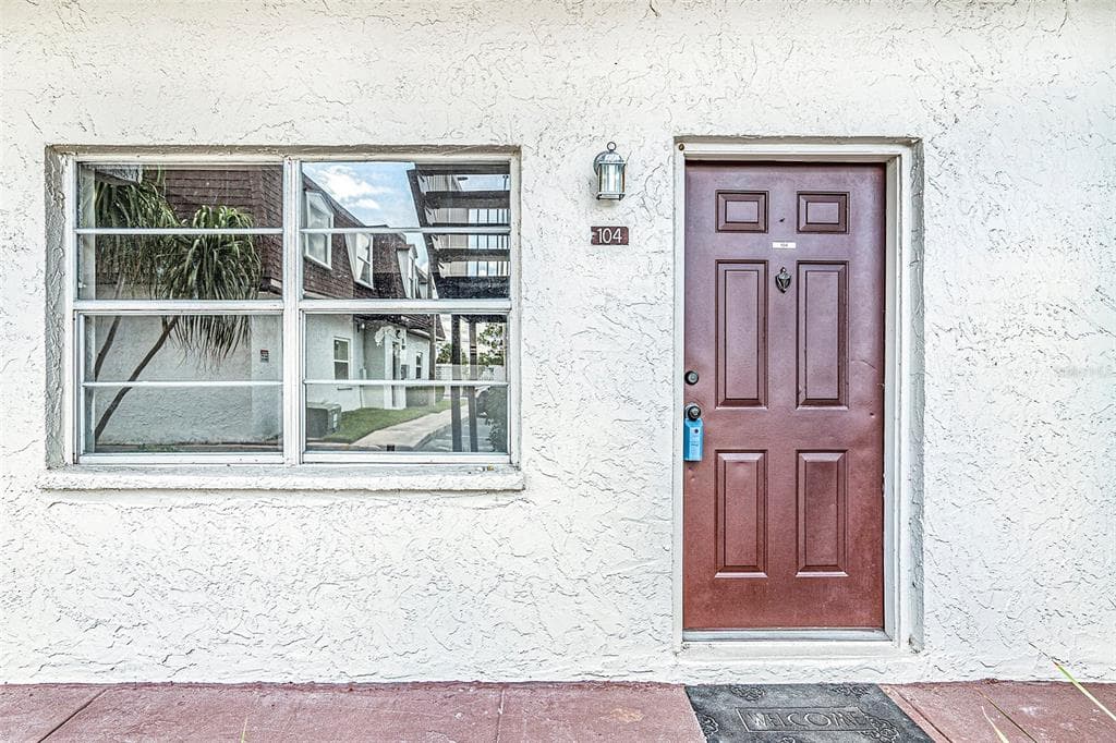 9221 TUDOR DRIVE UNIT A104 TAMPA, FL 33615