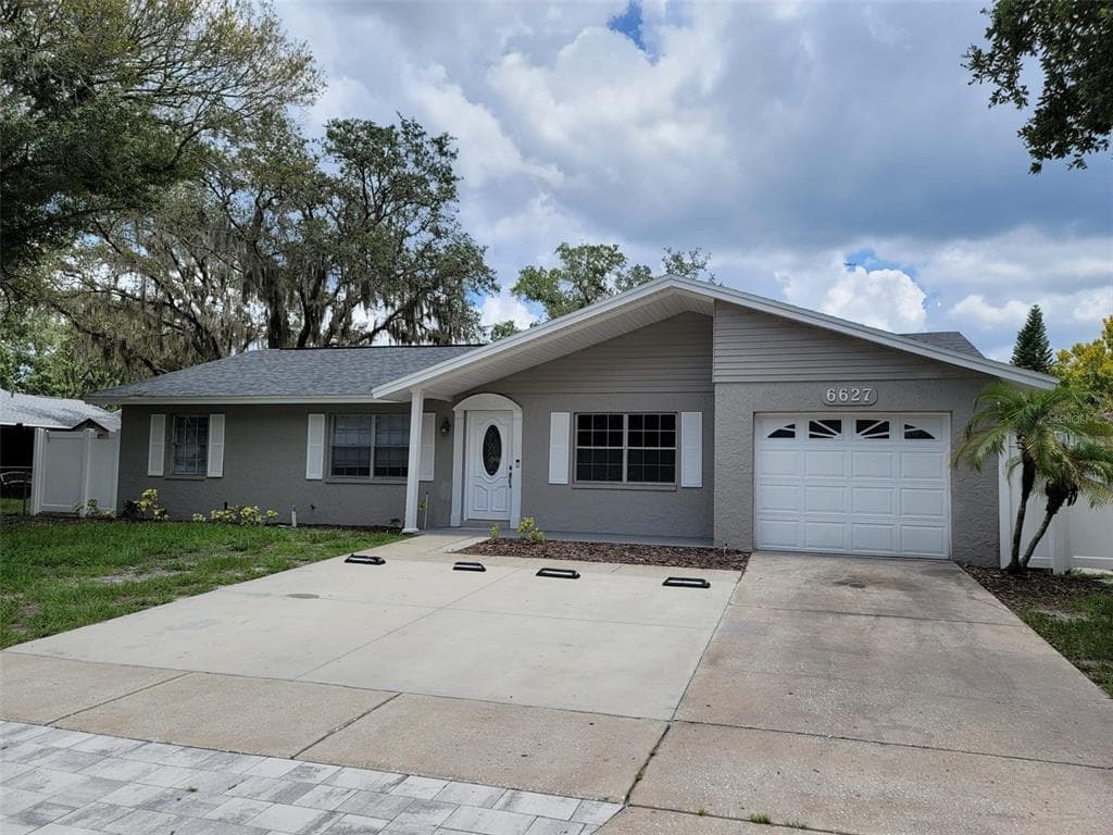 6627 WINDING OAK DRIVE TAMPA, FL 33625