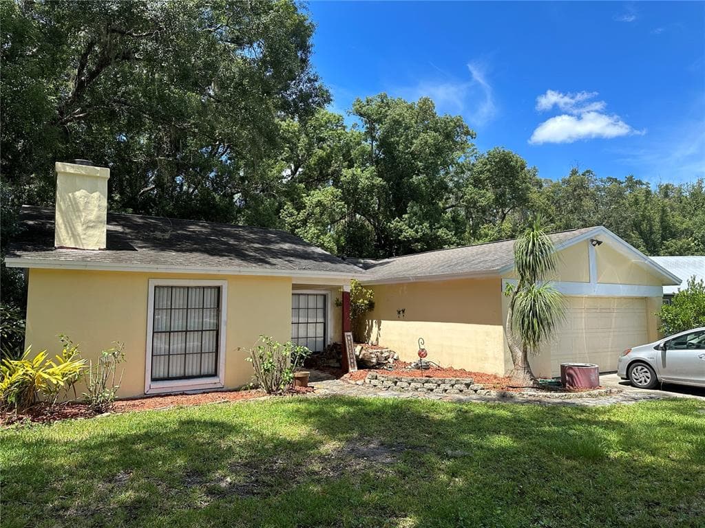 1032 WILDROSE DRIVE LUTZ, FL 33549