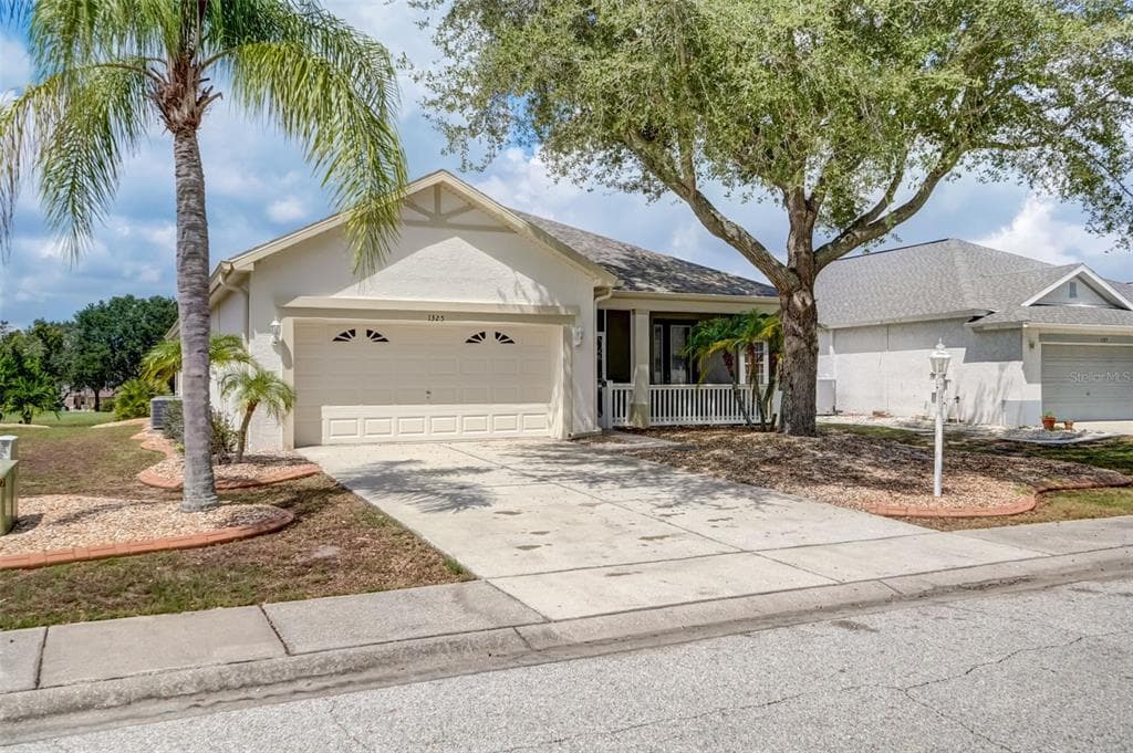 1325 MISTY GREENS DRIVE SUN CITY CENTER, FL 33573