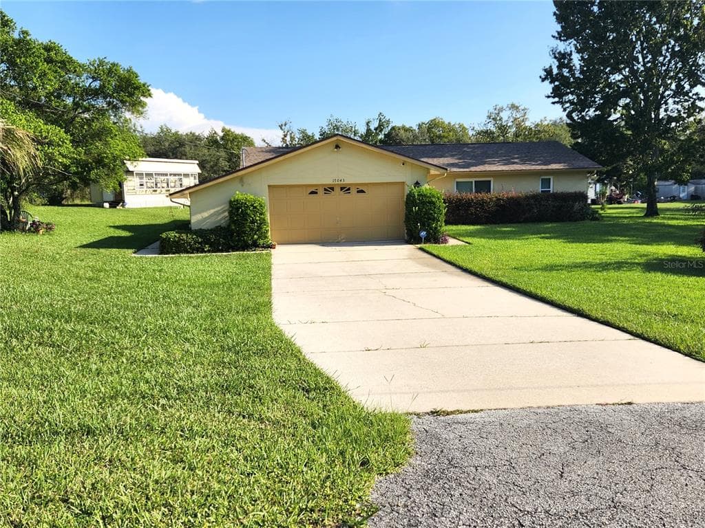 17043 CARLESIMO AVENUE SPRING HILL, FL 34610