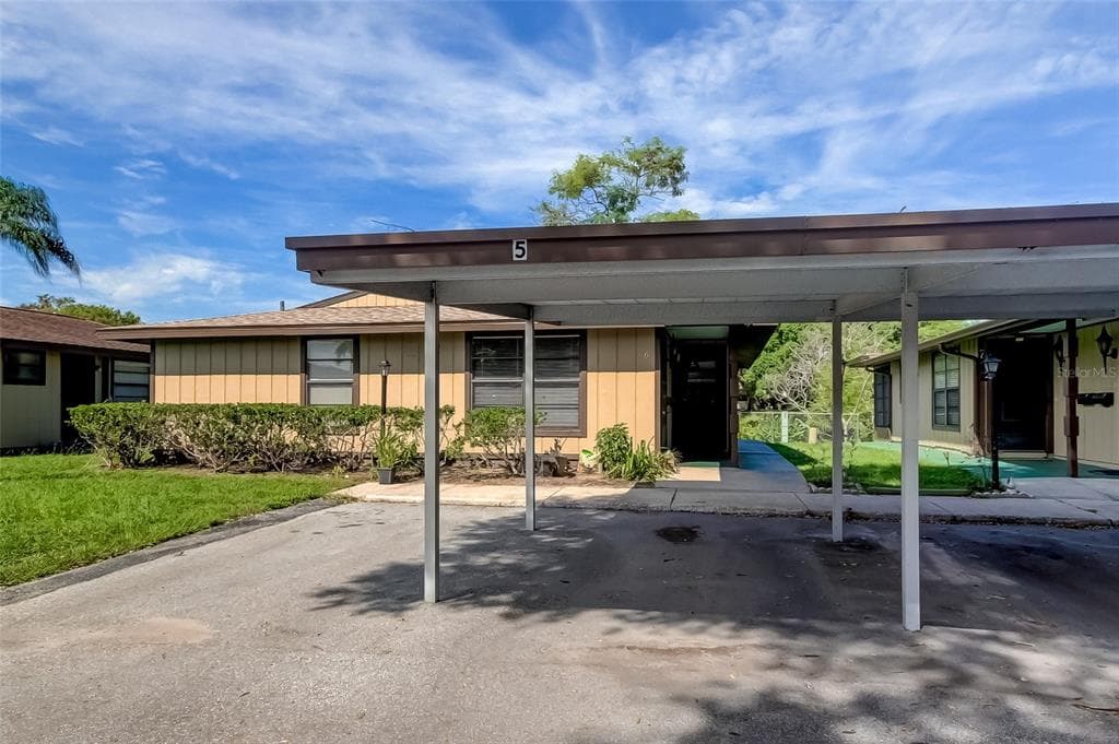 1980 TAHITIAN PLACE UNIT 5 DUNEDIN, FL 34698