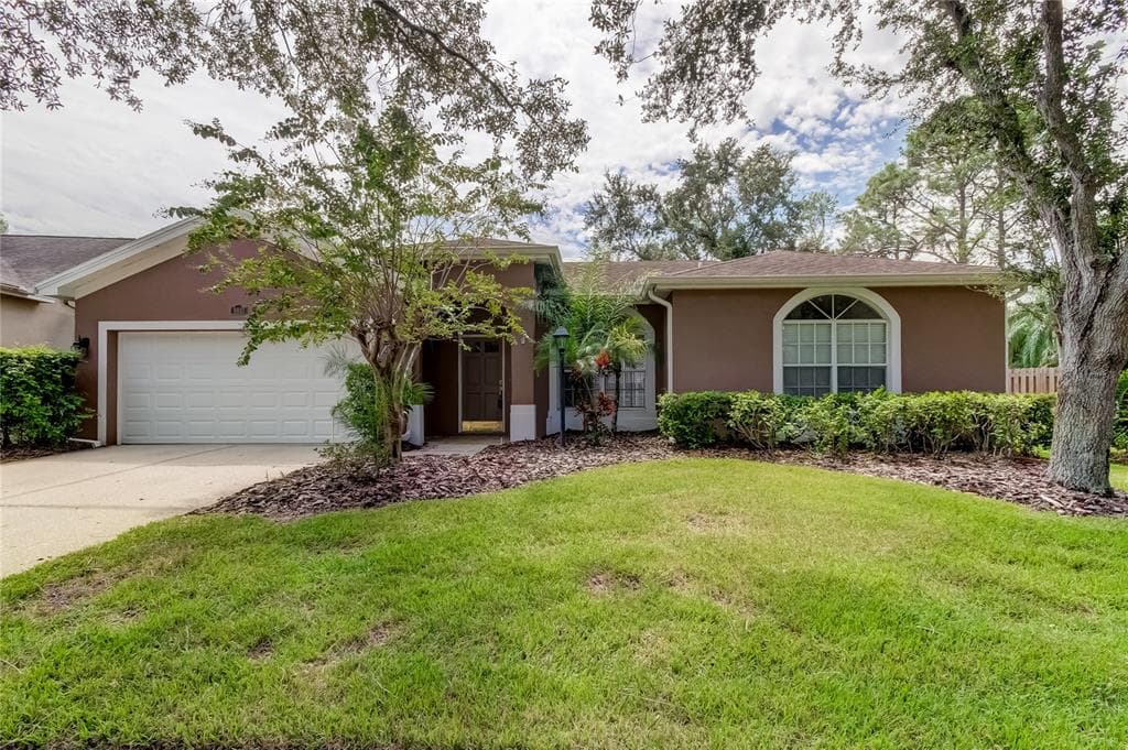 9810 BENNINGTON DRIVE TAMPA, FL 33626