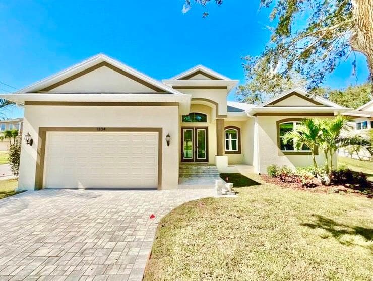 1334 BELCHER DRIVE TARPON SPRINGS, FL 34689