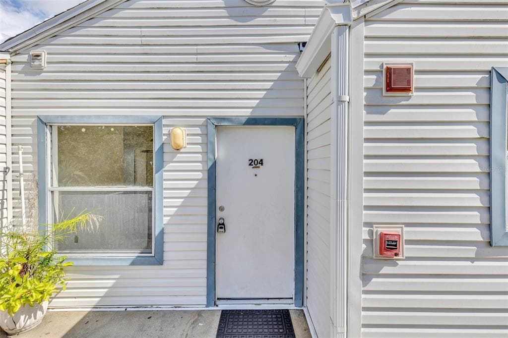 2556 WOODGATE BOULEVARD UNIT 204 ORLANDO, FL 32822