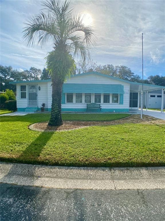 920 ORCHID STREET LADY LAKE, FL 32159