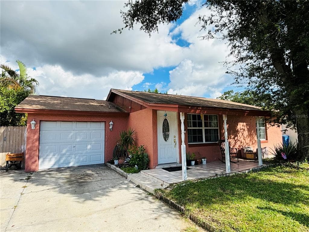8803 FROSTWOOD COURT TAMPA, FL 33634