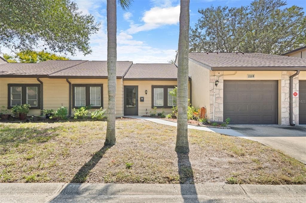 2101 SUNSET POINT ROAD UNIT 203 CLEARWATER, FL 33765