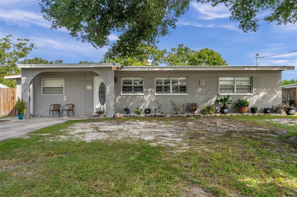 7704 SOUTHSIDE LANE TAMPA, FL 33619