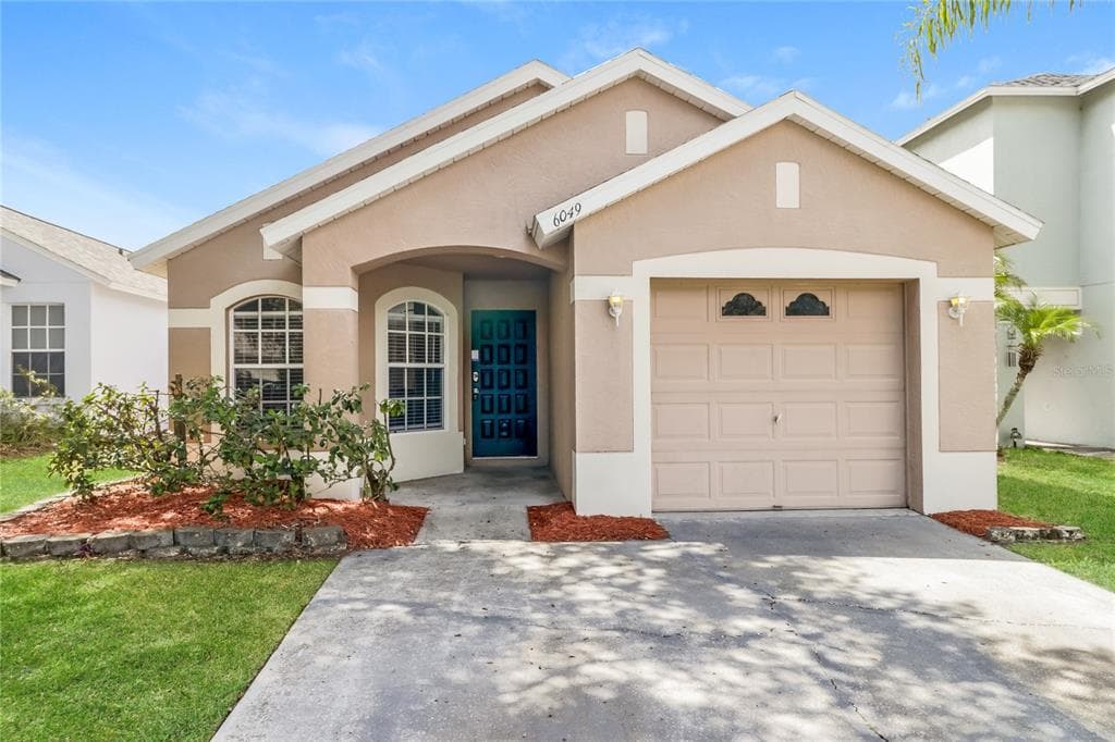 6049 SAND KEY LANE WESLEY CHAPEL, FL 33545