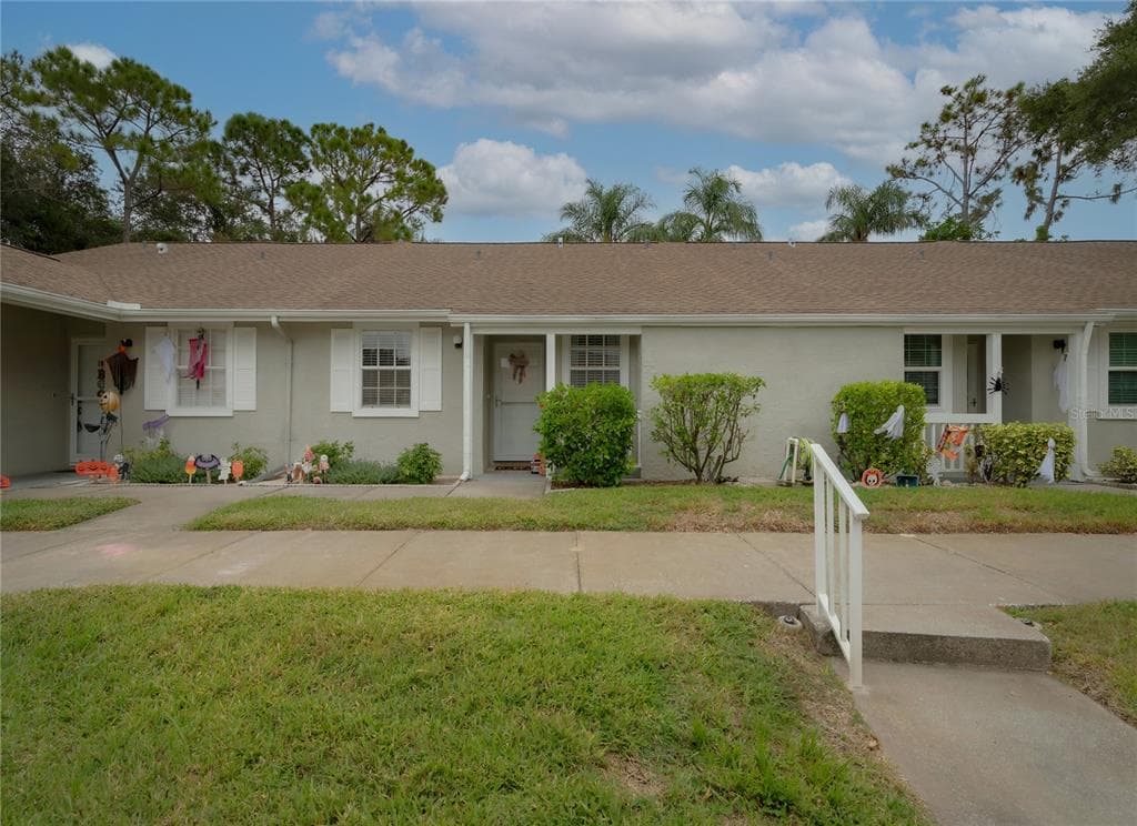 1505 OAK HILL DRIVE UNIT 102 DUNEDIN, FL 34698