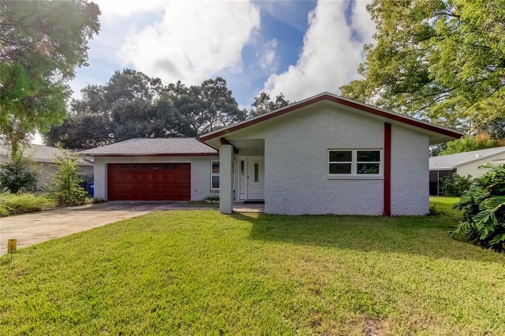 1174 BROOK DRIVE W DUNEDIN, FL 34698