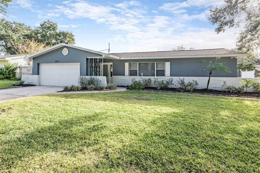 1347 WHISPERING PINES DRIVE