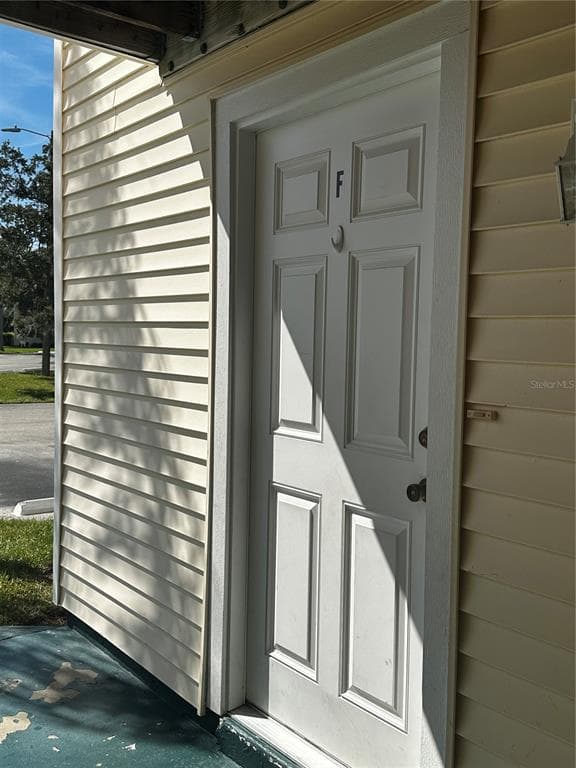 124 LOBLOLLY COURT UNIT F OLDSMAR, FL 34677