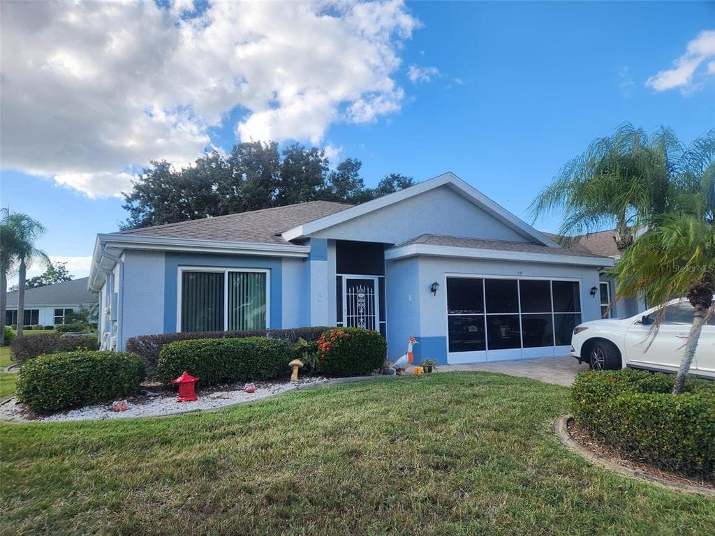 713 MANCHESTER WOODS DRIVE SUN CITY CENTER, FL 33573