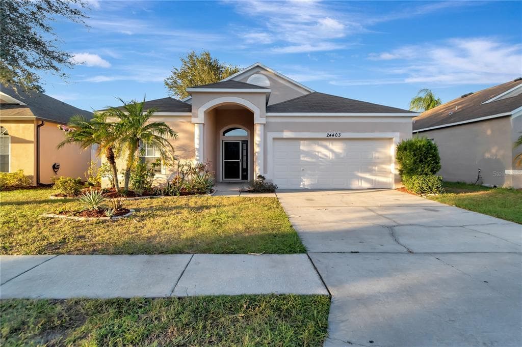 24403 BREEZY OAK COURT LUTZ, FL 33559