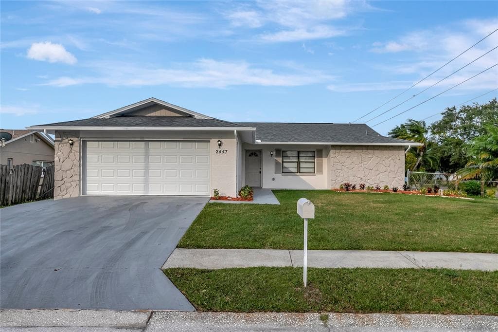 2447 MONDALE COURT HOLIDAY, FL 34691