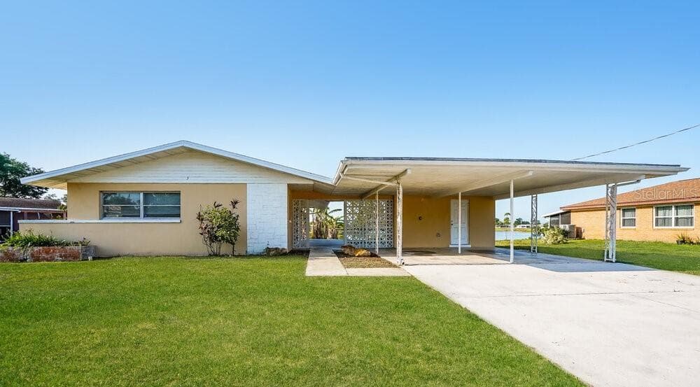 502 LEELAND HEIGHTS BOULEVARD E LEHIGH ACRES, FL 33936