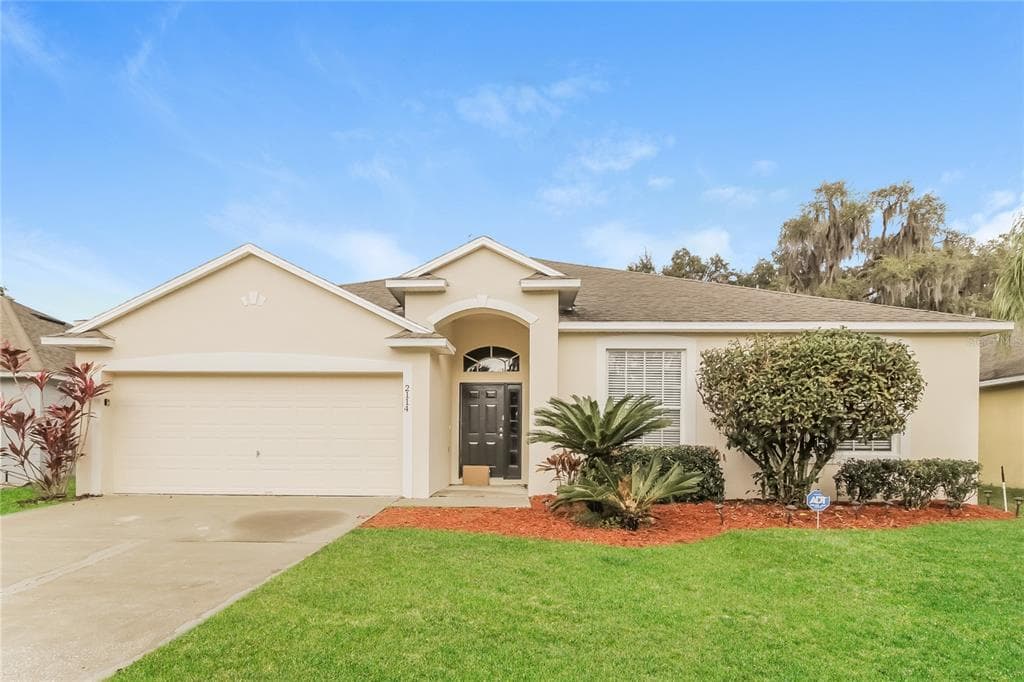 2114 THE OAKS BOULEVARD KISSIMMEE, FL 34746