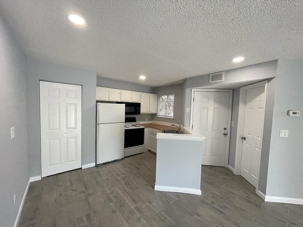 1908 LAKE ATRIUMS CIRCLE UNIT 3 ORLANDO, FL 32839