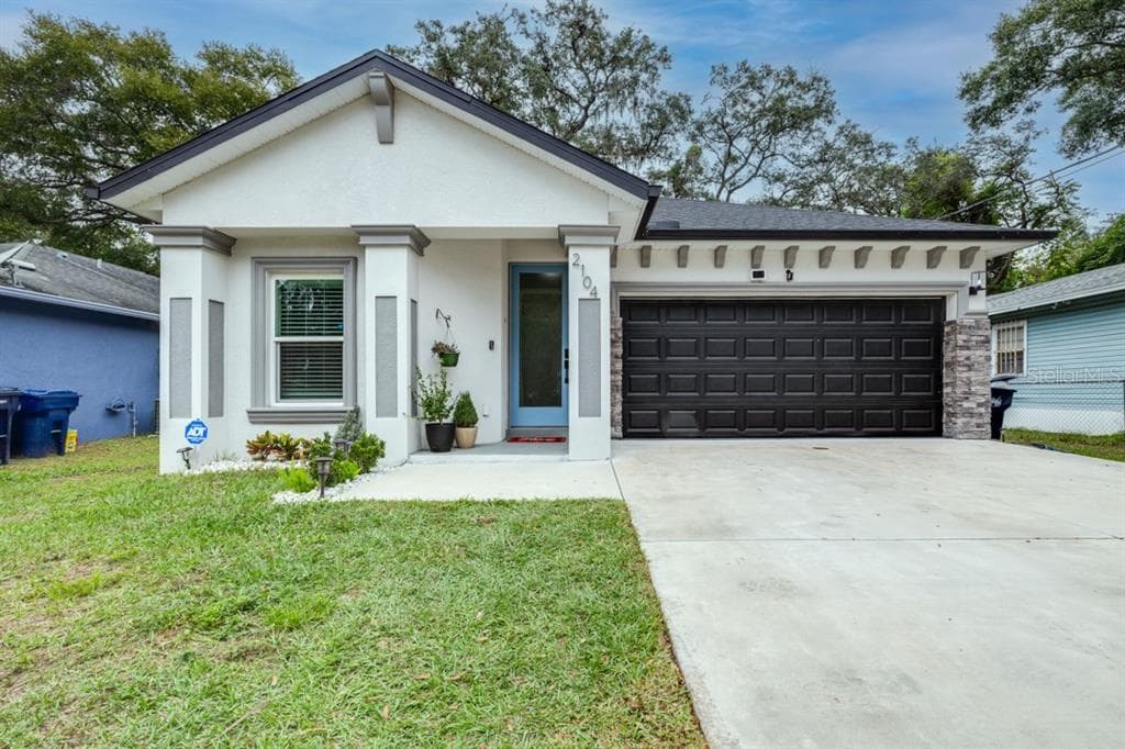 2104 E ELLICOTT STREET TAMPA, FL 33610