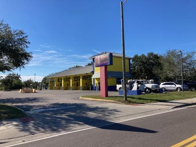 7729 PALM RIVER ROAD TAMPA, FL 33619