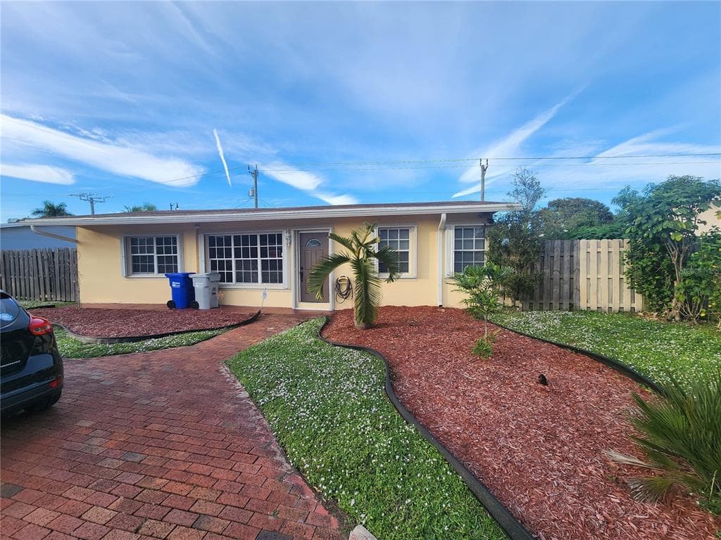 1411 NE 32ND PLACE POMPANO BEACH, FL 33064