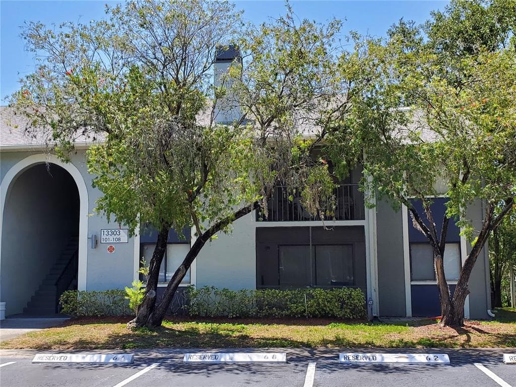 13303 WHISPERING PALMS PLACE SW UNIT 108 LARGO, FL 33774