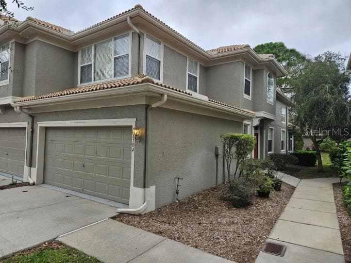 3304 COVERED BRIDGE DRIVE E DUNEDIN, FL 34698