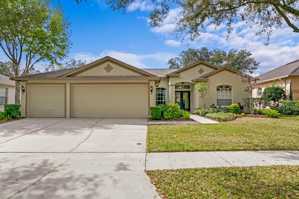 9406 HUNTERS POND DRIVE TAMPA, FL 33647