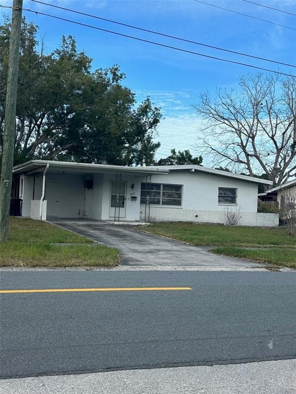 1242 ROBIN HOOD LANE DUNEDIN, FL 34698