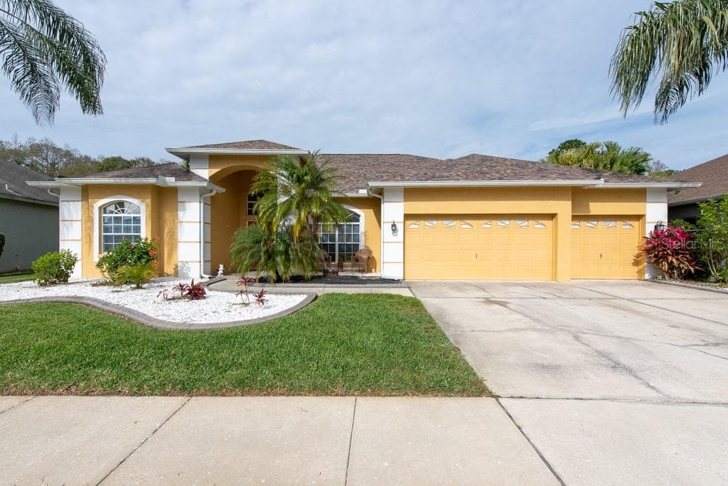 1521 DEERBOURNE DRIVE WESLEY CHAPEL, FL 33543