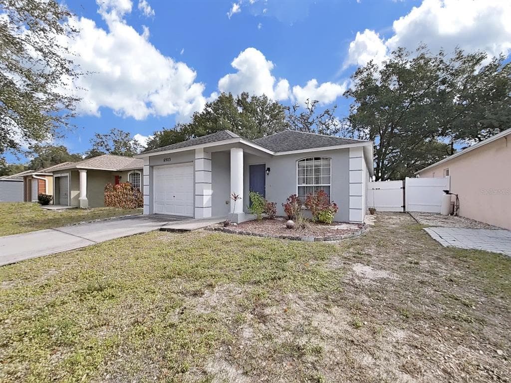 6903 WILDWOOD OAK DRIVE TAMPA, FL 33617