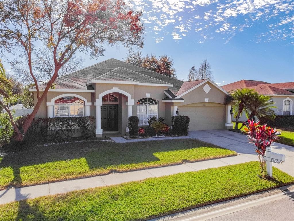 1936 TANGLEDVINE DRIVE WESLEY CHAPEL, FL 33543
