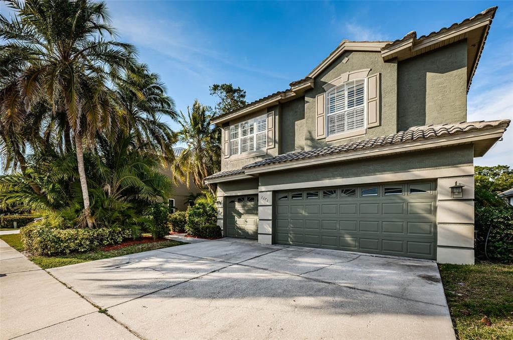 2278 HIGHLAND WOODS DRIVE DUNEDIN, FL 34698