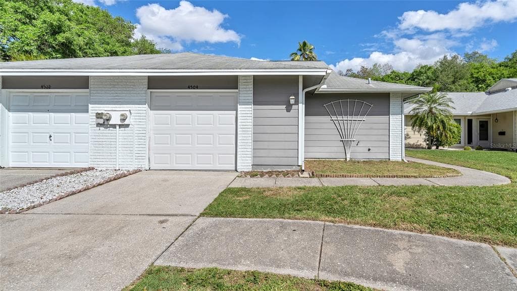 4504 CEDARWOOD VILLAGE DRIVE TAMPA, FL 33624