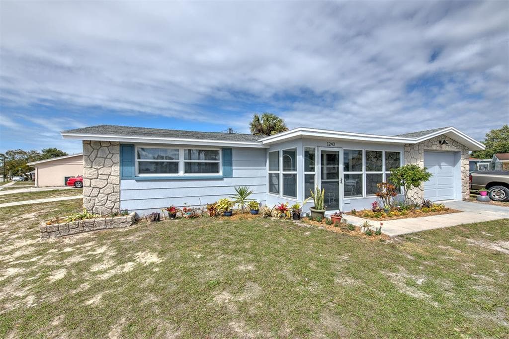 1243 SALTCREEK COURT HOLIDAY, FL 34690