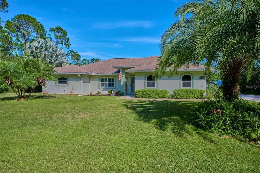 6813 AMARYLLIS DRIVE S INDIAN LAKE ESTATES, FL 33855
