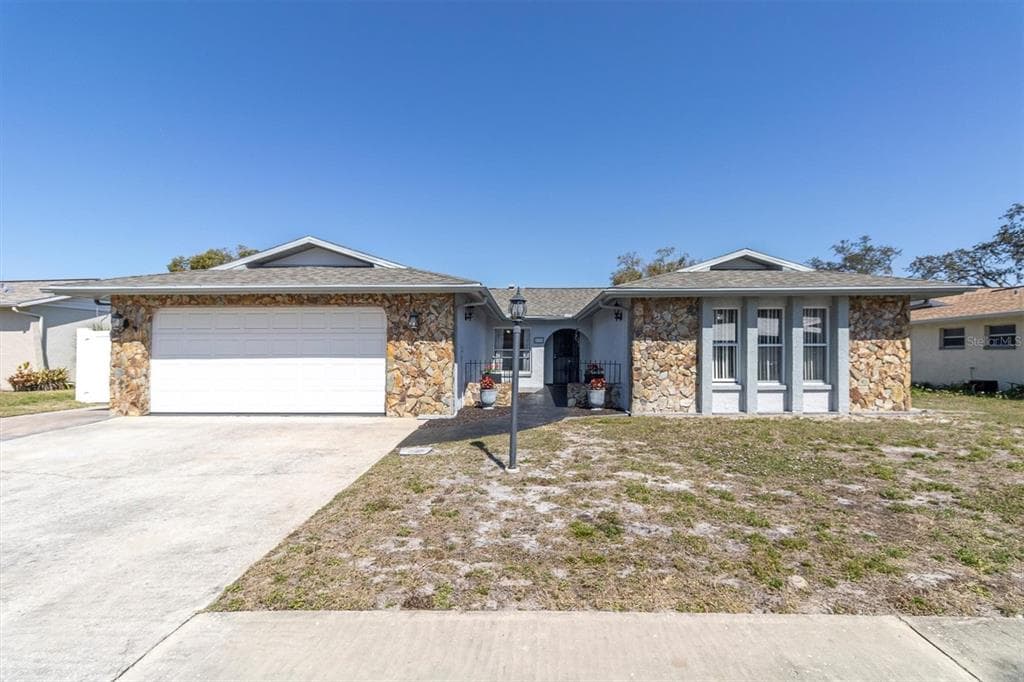 8731 WOODMONT LANE PORT RICHEY, FL 34668