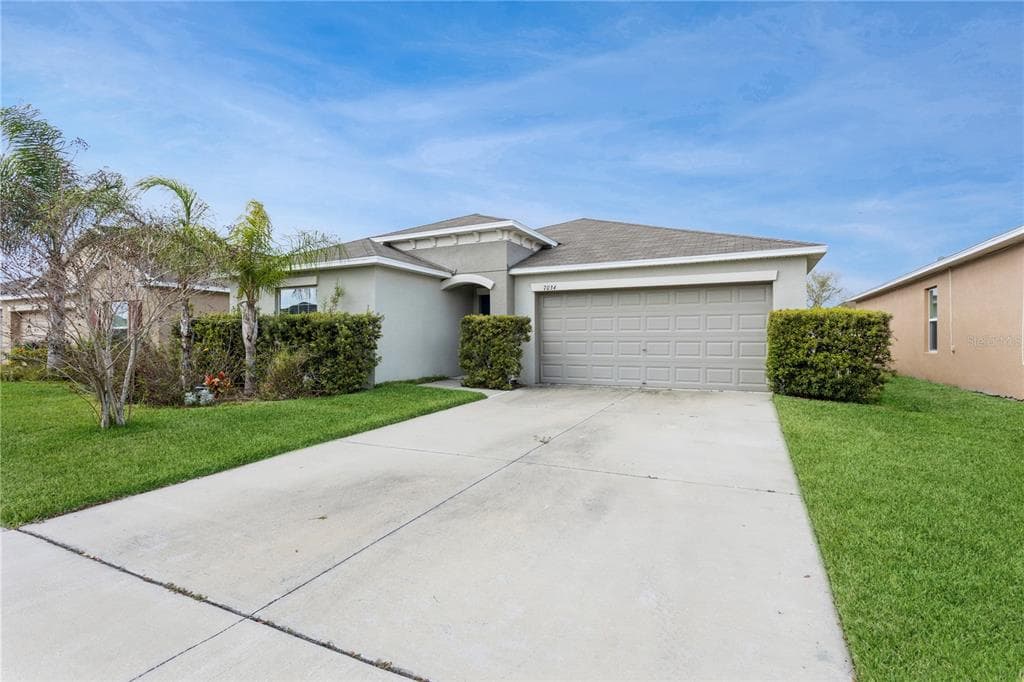 7034 WISEMAN RUN DRIVE SUN CITY CENTER, FL 33573