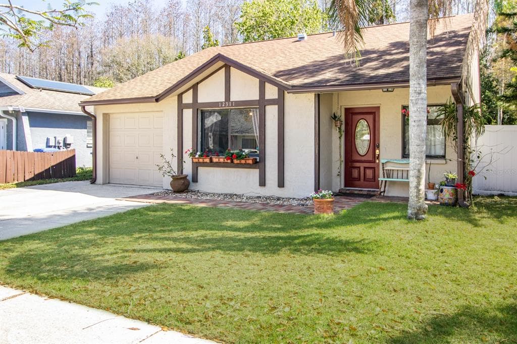 12311 HIDDEN BROOK DRIVE TAMPA, FL 33624