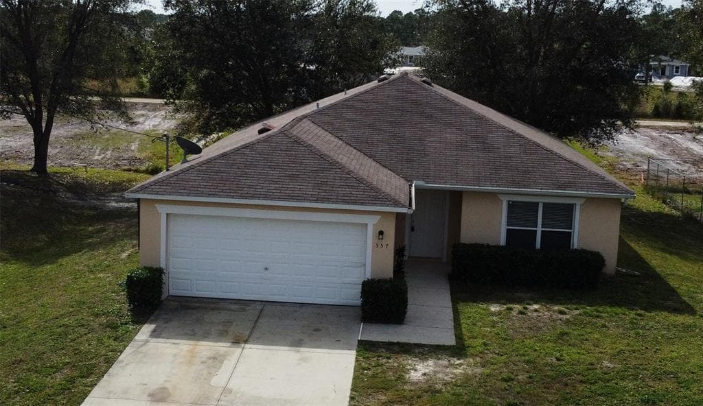 557 WINDERMERE DRIVE LEHIGH ACRES, FL 33972