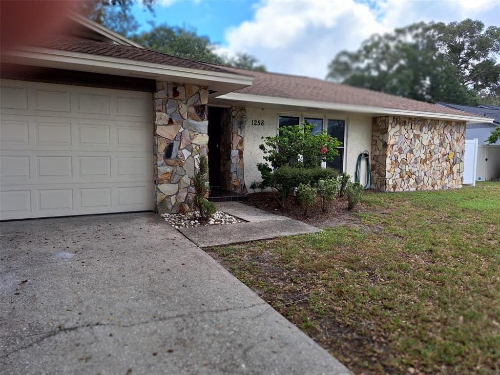 1258 BOLIVAR COURT DUNEDIN, FL 34698