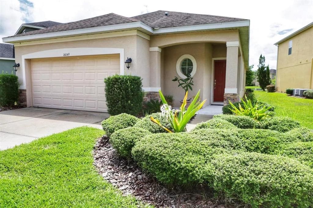 16049 BELLA WOODS DRIVE TAMPA, FL 33647