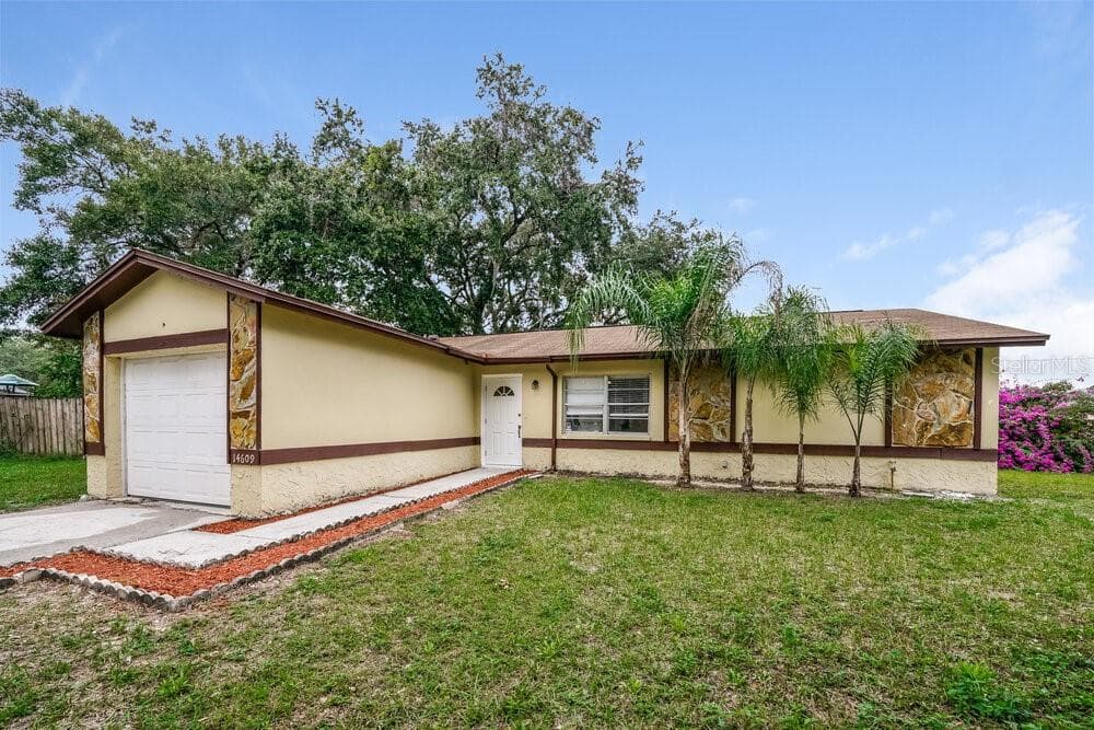 14609 KNOLL RIDGE DRIVE TAMPA, FL 33625