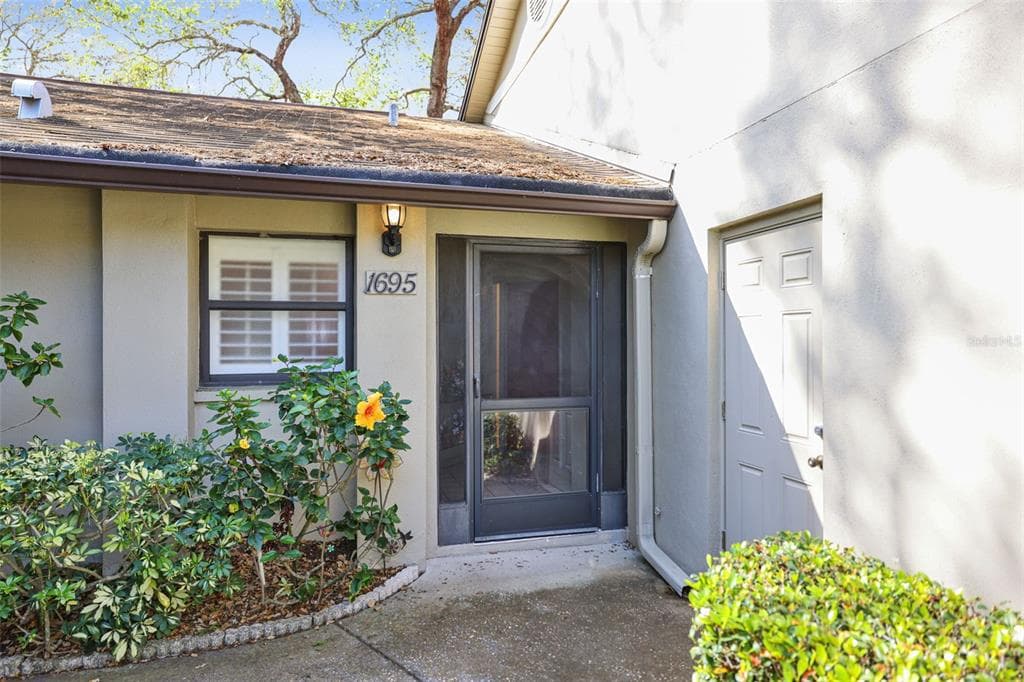 1695 HAMILTON COURT DUNEDIN, FL 34698