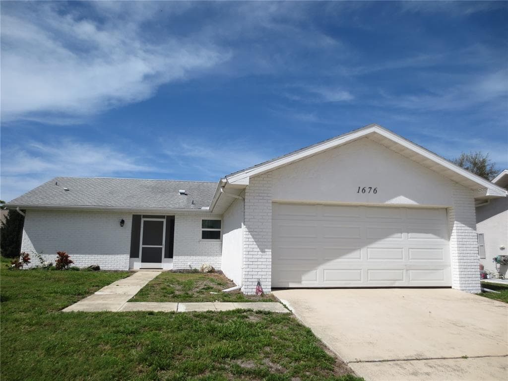 1676 CALEDONIA DRIVE PALM HARBOR, FL 34684