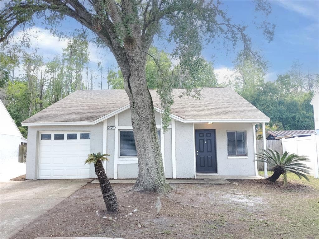 12330 WITHERIDGE DRIVE TAMPA, FL 33624